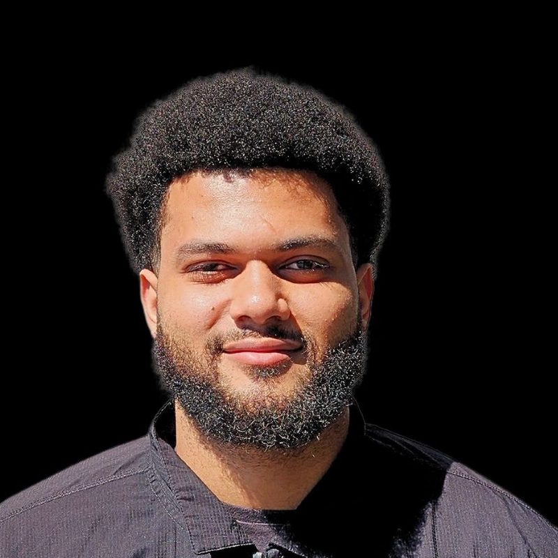 Christian K, photographed on the shop’s black backdrop.