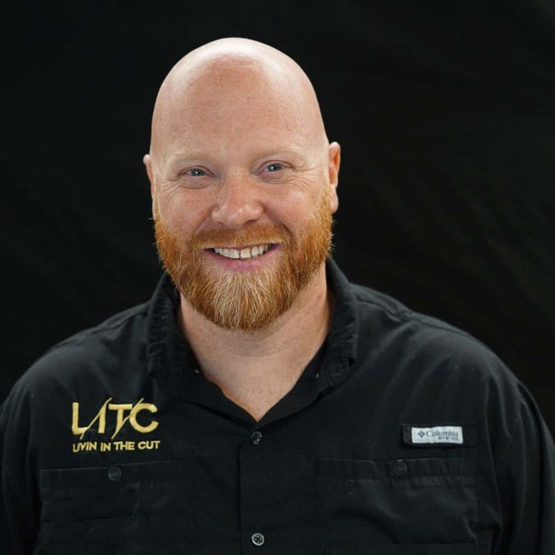 Greg, photographed on the shop’s black backdrop.